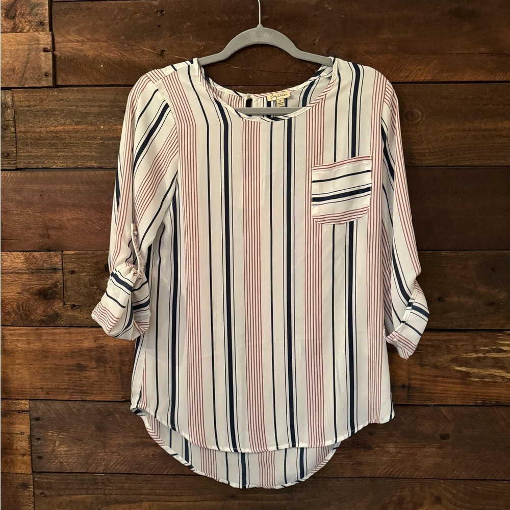 Brown and blue stripes on white blouse